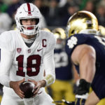 Stanford quarterback Tanner McKee watches a Notre Dame rusher during the first half of an NCAA college football game in South Bend, Ind., Saturday, Oct. 15, 2022. (AP Photo/Nam Y. Huh)