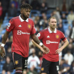 Manchester United's Fred and his teammate Christian Eriksen react after Manchester City's Phil Foden scored his side's sixth goal during the English Premier League soccer match between Manchester City and Manchester United at Etihad stadium in Manchester, England, Sunday, Oct. 2, 2022. (AP Photo/Rui Vieira)