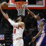 
              Chicago Bulls guard Zach LaVine (8) shoots against Philadelphia 76ers guard De'Anthony Melton, right, during the first half of an NBA basketball game Saturday, Oct. 29, 2022, in Chicago. (AP Photo/Matt Marton)
            