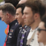 
              Red Bull team principal Christian Horner, left, pauses during the national anthem before the Formula One U.S. Grand Prix auto race at Circuit of the Americas, Sunday, Oct. 23, 2022, in Austin, Texas. (AP Photo/Darron Cummings)
            
