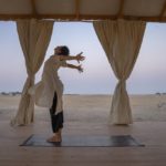 
              Indian yoga teacher Diksh practices where she gives classes at Heenat Salma farm in Al Shahaniah, Qatar, Wednesday, Oct. 19, 2022. (AP Photo/Nariman El-Mofty)
            
