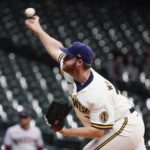 Milwaukee Brewers starting pitcher Brandon Woodruff throws during the first inning of a baseball game against the Arizona Diamondbacks Monday, Oct. 3, 2022, in Milwaukee. (AP Photo/Morry Gash)