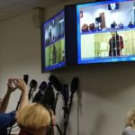 
              WNBA star and two-time Olympic gold medalist Brittney Griner is seen on the bottom part of a TV screen as she appears in a video link provided by the Russian Federal Penitentiary Service a courtroom prior to a hearing at the Moscow Regional Court in Moscow, Russia, Tuesday, Oct. 25, 2022. A Russian court has started hearing American basketball star Brittney Griner’s appeal against her nine-year prison sentence for drug possession (AP Photo/Alexander Zemlianichenko)
            
