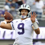 
              Kansas State quarterback Adrian Martinez (9) warms up before an NCAA college football game against TCU, Saturday, Oct. 22, 2022, in Fort Worth, Texas. (AP Photo/Richard W. Rodriguez)
            