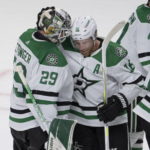 
              Dallas Stars goaltender Jake Oettinger (29) celebrates with teammate Joe Pavelski (16) after defeating the Montreal Canadiens in NHL hockey game action Saturday, Oct. 22, 2022, in Montreal. (Ryan Remiorz/The Canadian Press via AP)
            