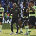 Manchester City's head coach Pep Guardiola talks with Manuel Akanji at the end of the English Premier League soccer match between Leicester City and Manchester City at King Power stadium in Leicester, England, Saturday, Oct. 29, 2022. (AP Photo/Rui Vieira)