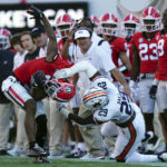 
              Georgia running back Kenny McIntosh (6) is tackled by Auburn linebacker Derick Hall (29) after a catch during the first half of an NCAA college football game Saturday, Oct. 8, 2022, in Athens, Ga. (AP Photo/John Bazemore)
            