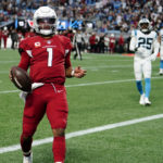 Arizona Cardinals quarterback Kyler Murray scores against the Carolina Panthers during the second half of an NFL football game on Sunday, Oct. 2, 2022, in Charlotte, N.C. (AP Photo/Jacob Kupferman)