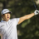 Kurt Kitayama reacts to his drive off the 12th tee during the third round of the CJ Cup golf tournament Saturday, Oct. 22, 2022, in Ridgeland, S.C. (AP Photo/Stephen B. Morton)