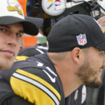 Pittsburgh Steelers quarterback Mitch Trubisky (10), right, sites on the bench beside Mason Rudolph as Kenny Pickett plays against the New York Jets during the second half of an NFL football game, Sunday, Oct. 2, 2022, in Pittsburgh. (AP Photo/Gene J. Puskar)