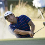 Kurt Kitayama hits out of a bunker on the 17th green during the final round of the CJ Cup golf tournament Sunday, Oct. 23, 2022, in Ridgeland, S.C. (AP Photo/Stephen B. Morton)