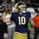 
              Notre Dame quarterback Drew Pyne looks to pass during the first half of the team's NCAA college football game against Stanford in South Bend, Ind., Saturday, Oct. 15, 2022. (AP Photo/Nam Y. Huh)
            