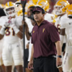 Arizona State head coach Shaun Aguano stands on the sideline during the second half of an NCAA college football game against Southern California Saturday, Oct. 1, 2022, in Los Angeles. (AP Photo/Mark J. Terrill)