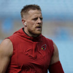 
              Arizona Cardinals defensive end J.J. Watt warms up before an NFL football game against the Carolina Panthers on Sunday, Oct. 2, 2022, in Charlotte, N.C. (AP Photo/Rusty Jones)
            