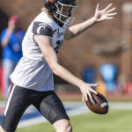 
              Cincinnati punter Mason Fletcher (31) punts the ball during the first half of an NCAA college football game against against SMU, Saturday, Oct. 22, 2022, in Dallas. (AP Photo/Brandon Wade)
            
