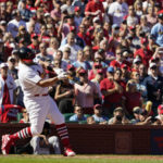
              St. Louis Cardinals' Albert Pujols hits a solo home run during the third inning of a baseball game against the Pittsburgh Pirates Sunday, Oct. 2, 2022, in St. Louis. (AP Photo/Jeff Roberson)
            