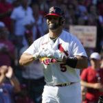 
              St. Louis Cardinals' Albert Pujols celebrates after hitting a solo home run during the third inning of a baseball game against the Pittsburgh Pirates Sunday, Oct. 2, 2022, in St. Louis. (AP Photo/Jeff Roberson)
            