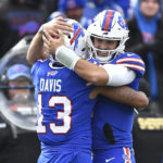 
              Buffalo Bills quarterback Josh Allen, right, celebrates a touchdown with wide receiver Gabe Davis (13) during the first half of an NFL football game against the Pittsburgh Steelers in Orchard Park, N.Y., Sunday, Oct. 9, 2022. (AP Photo/Adrian Kraus)
            