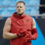 
              Arizona Cardinals defensive end J.J. Watt warms up before an NFL football game against the Carolina Panthers on Sunday, Oct. 2, 2022, in Charlotte, N.C. (AP Photo/Rusty Jones)
            