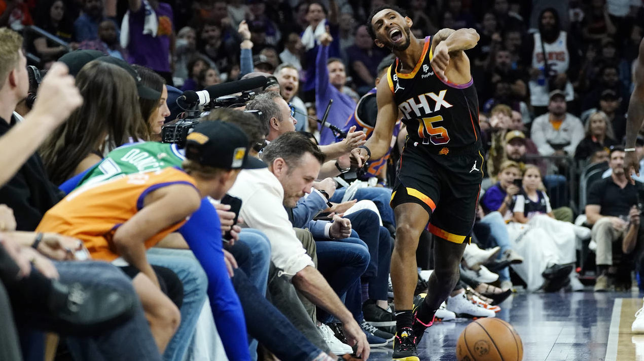 Phoenix Suns guard Cameron Payne celebrates a turnover by the Dallas Mavericks during the second ha...