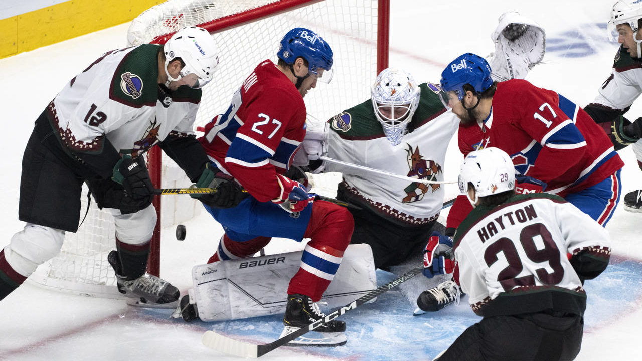 Montreal Canadiens' Josh Anderson (17) scores against Arizona Coyotes goaltender Connor Ingram, thi...
