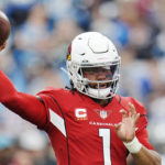Arizona Cardinals quarterback Kyler Murray passes against the Carolina Panthers during the first half of an NFL football game on Sunday, Oct. 2, 2022, in Charlotte, N.C. (AP Photo/Rusty Jones)