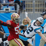 
              San Francisco 49ers linebacker Dre Greenlaw breaks up a pass intended for Carolina Panthers running back Christian McCaffrey during the first half an NFL football game on Sunday, Oct. 9, 2022, in Charlotte, N.C. (AP Photo/Rusty Jones)
            