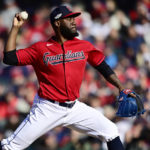 Cleveland Guardians' Enyel De Los Santos pitches in the 12th inning of a wild card baseball playoff game against the Tampa Bay Rays, Saturday, Oct. 8, 2022, in Cleveland. (AP Photo/David Dermer)