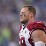Arizona Cardinals defensive end J.J. Watt watches from the sideline during the second half of an NFL football game against the Seattle Seahawks in Seattle, Sunday, Oct. 16, 2022. (AP Photo/Abbie Parr)