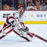 Carolina Hurricanes' Antti Raanta clears the puck during the second period of an NHL hockey game against the Philadelphia Flyers, Saturday, Oct. 29, 2022, in Philadelphia. (AP Photo/Matt Slocum)