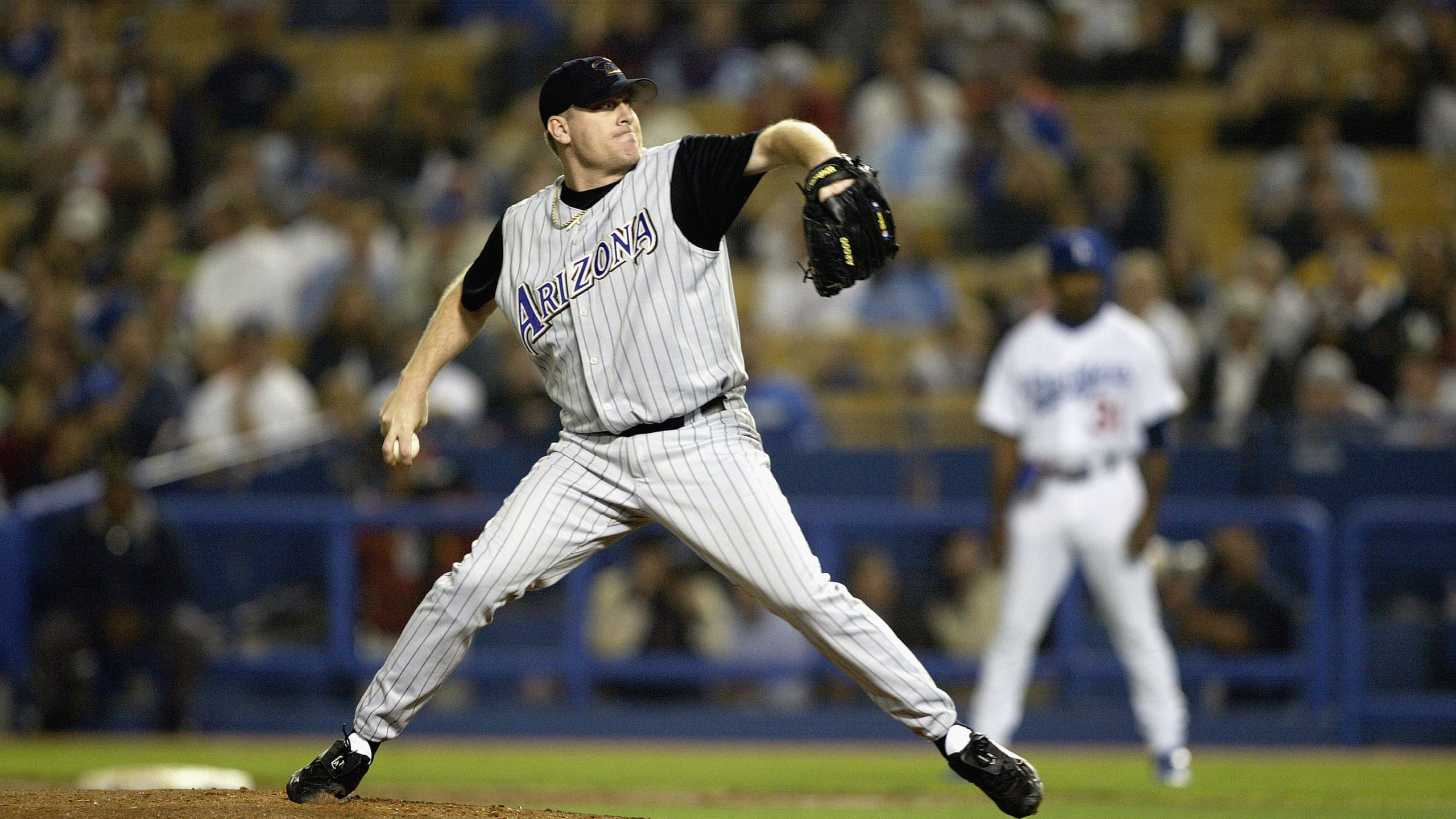 Curt Schilling #38 of the Arizona Diamondbacks throws against the Los Angeles Dodgers during the ga...