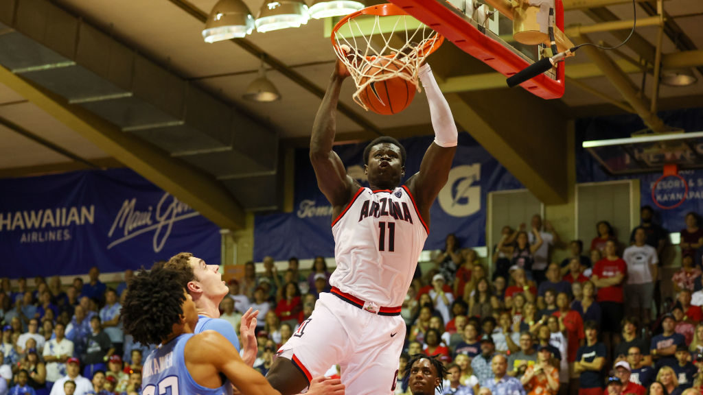 Oumar Ballo #11 of the Arizona Wildcats dunks the ball in the second half of the game against the C...