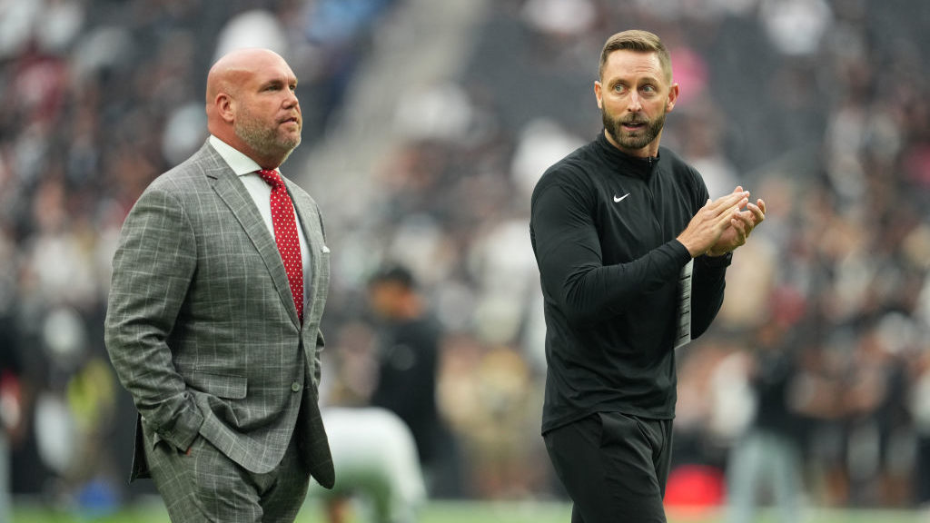 Head coach Kliff Kingsbury and general manager Steve Keim of the Arizona Cardinals look on during w...