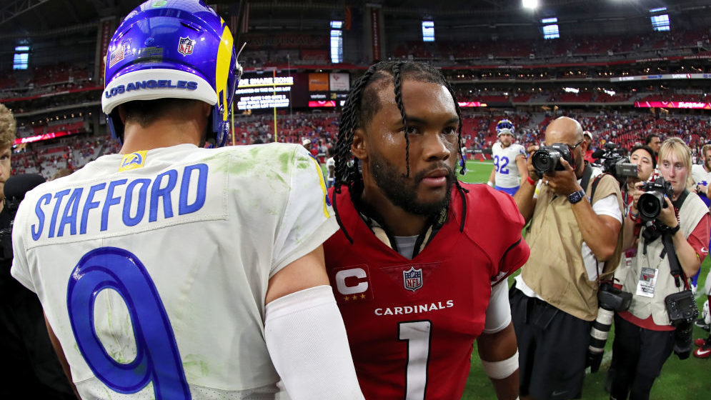Matthew Stafford #9 of the Los Angeles Rams and Kyler Murray #1 of the Arizona Cardinals interact a...