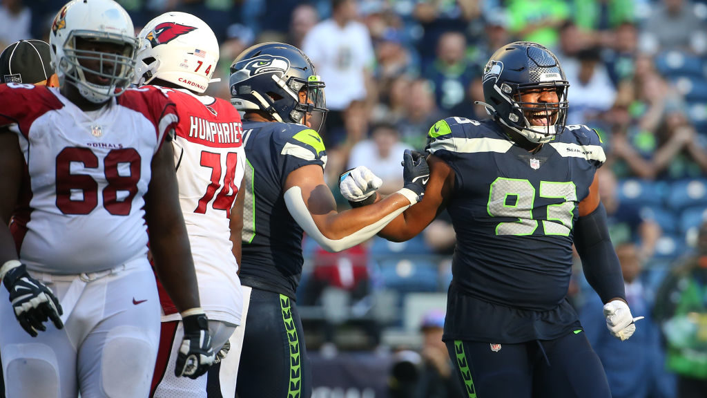 Shelby Harris #93 of the Seattle Seahawks celebrates a sack against the Arizona Cardinals during th...