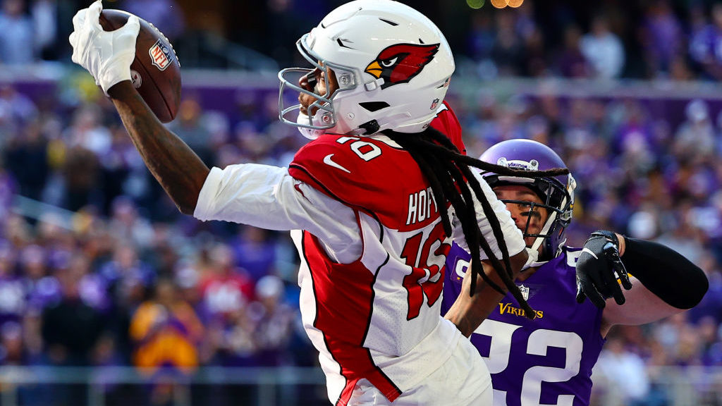 DeAndre Hopkins #10 of the Arizona Cardinals catches the ball for a touchdown as Harrison Smith #22...
