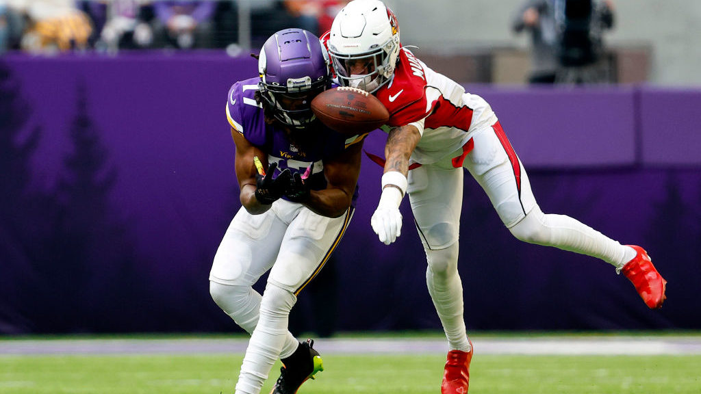 Byron Murphy Jr. #7 of the Arizona Cardinals breaks up a pass intended for K.J. Osborn #17 of the M...