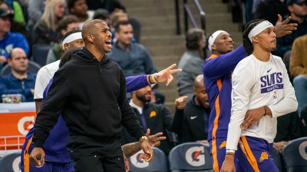 Chris Paul #3 of the Phoenix Suns reacts after a three point make by a teammate in the first quarte...