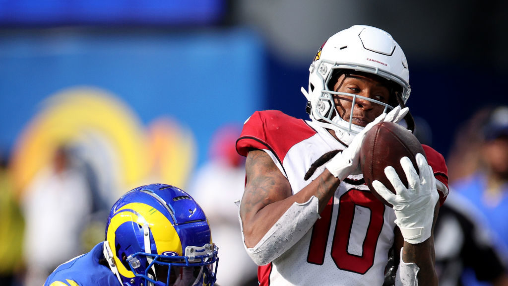 DeAndre Hopkins #10 of the Arizona Cardinals makes a catch in front of David Long Jr. #22 of the Lo...