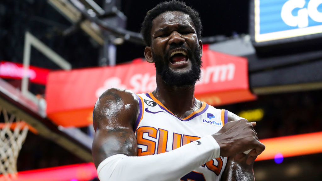 Deandre Ayton #22 of the Phoenix Suns reacts after being called for a foul against the Miami Heat d...