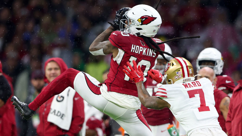 DeAndre Hopkins #10 of the Arizona Cardinals makes a catch over Charvarius Ward #7 of the San Franc...