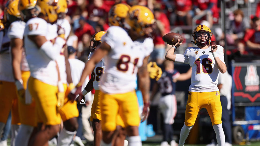 Quarterback Trenton Bourguet #16 of the Arizona State Sun Devils warms up before the NCAAF game aga...