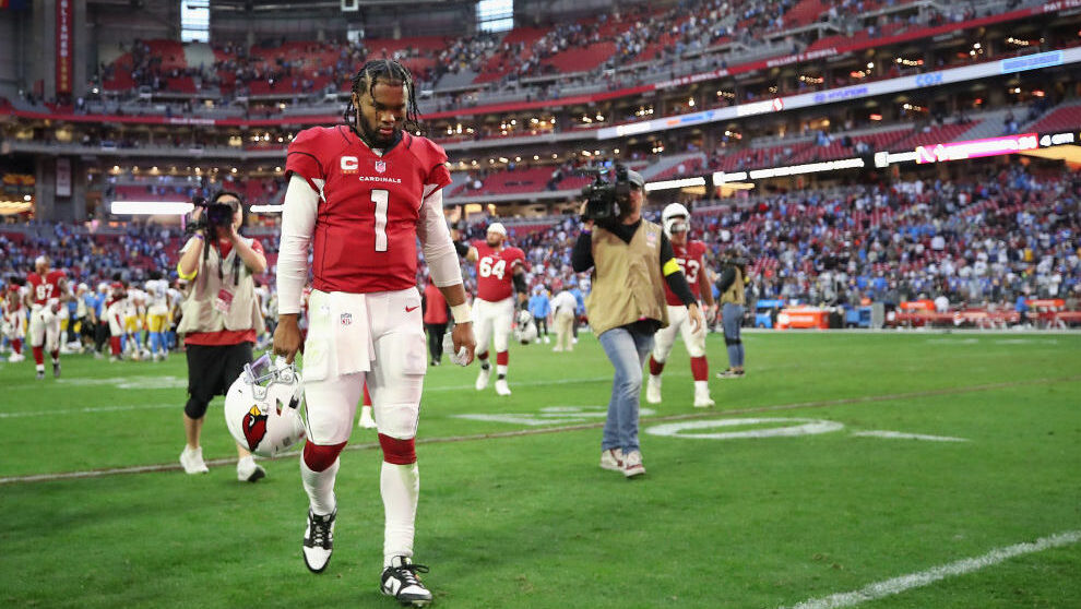 Quarterback Kyler Murray #1 of the Arizona Cardinals walks off the field following the NFL game at ...