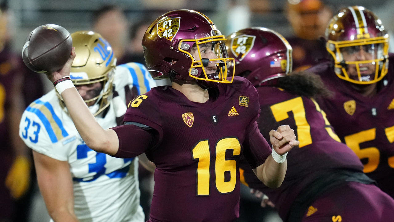 Arizona State quarterback Trenton Bourguet (16) throws a pass against UCLA during the first half of...