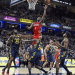 
              New Orleans Pelicans forward Zion Williamson (1) shoots over the Indiana Pacers defenseduring the second quarter of an NBA Basketball game, Monday, Nov. 7, 2022, in Indianapolis, Ind. (AP Photo/Marc Lebryk)
            
