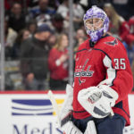 Washington Capitals goaltender Darcy Kuemper pauses during the second period of the team's NHL hockey game against the Colorado Avalanche, Saturday, Nov. 19, 2022, in Washington. (AP Photo/Jess Rapfogel)
