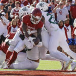 Oklahoma running back Eric Gray scores a touchdown against Baylor in the first half of an NCAA college football game, Saturday, Nov. 5, 2022, in Norman, Okla. (AP Photo/Nate Billings)
