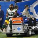 Green Bay Packers linebacker Rashan Gary (52) is carted off the field during the second half of an NFL football game against the Detroit Lions, Sunday, Nov. 6, 2022, in Detroit. (AP Photo/Paul Sancya)