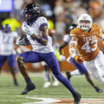 
              TCU wide receiver Quentin Johnston (1) runs past Texas linebacker Jett Bush (43) during the first half of an NCAA college football game Saturday, Nov. 12, 2022, in Austin, Texas. (AP Photo/Stephen Spillman)
            