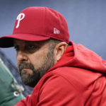 
              Philadelphia Phillies hitting coach Kevin Long watches during batting practice before Game 4 of baseball's World Series between the Houston Astros and the Philadelphia Phillies on Wednesday, Nov. 2, 2022, in Philadelphia. (AP Photo/David J. Phillip)
            